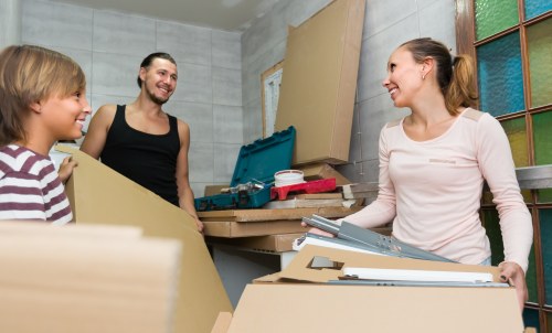 Removals team sorting recyclable items during a Sidcup move