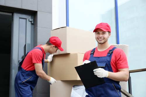 Removal team preparing a move in Sidcup residential street