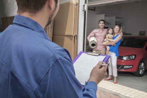 Home moving preparation in Sidcup with packed boxes and a moving van