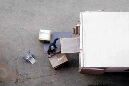Professional movers handling fragile household items