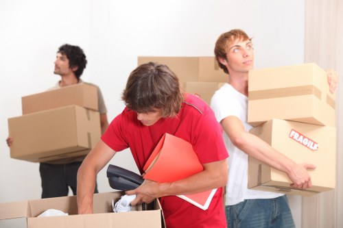 Prepared living room for furniture removals in Sidcup with labeled items
