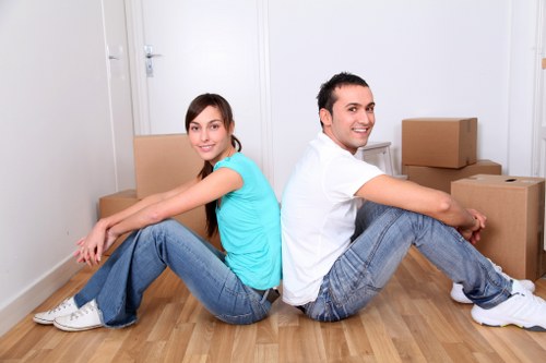 Local moving team handling boxes and furniture in Sidcup