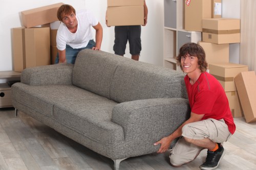 Packed boxes and furniture loaded for transport