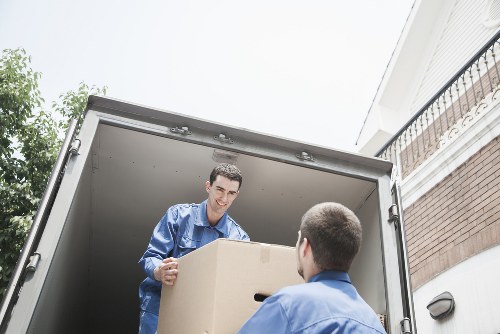 Packed office boxes and desks ready for transport in Sidcup